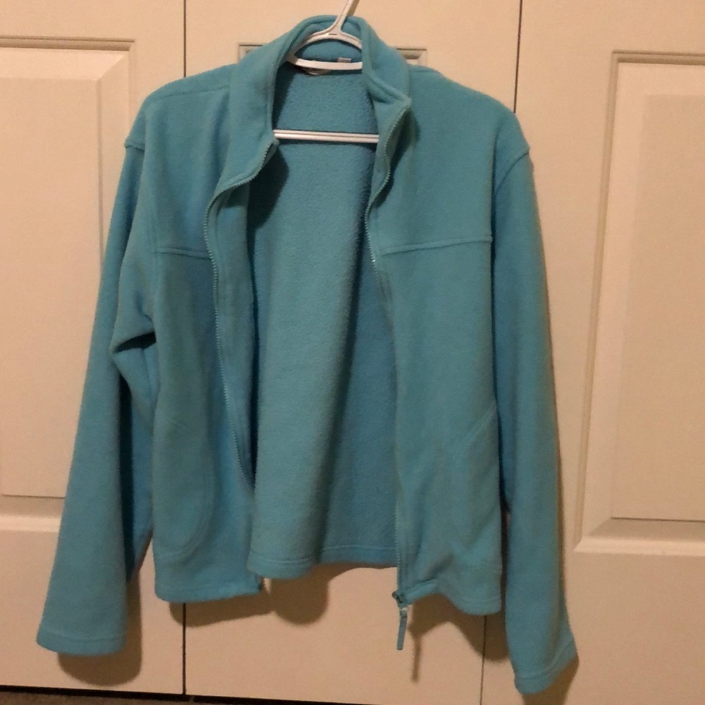 Light blue fuzzy coat.